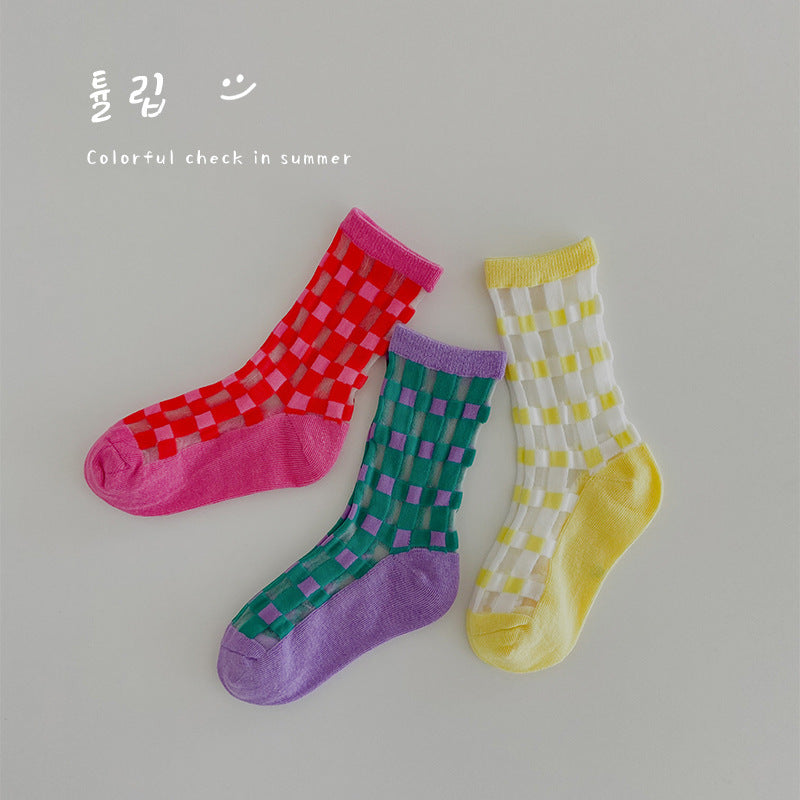 Chaussettes à carreaux assorties